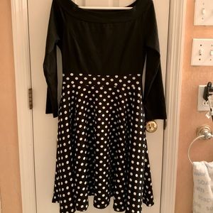 Quarter sleeved black and white polka dotted dress.